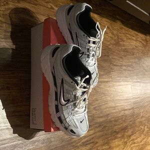 Nike trending P-6000 shoes. Like brand new.Worn twice. Needs a new fashion home.